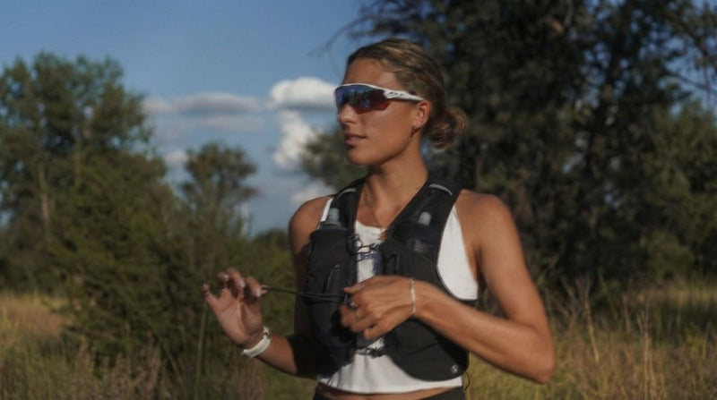 Ultra marathon runner wearing a hydration vest on a long trail run